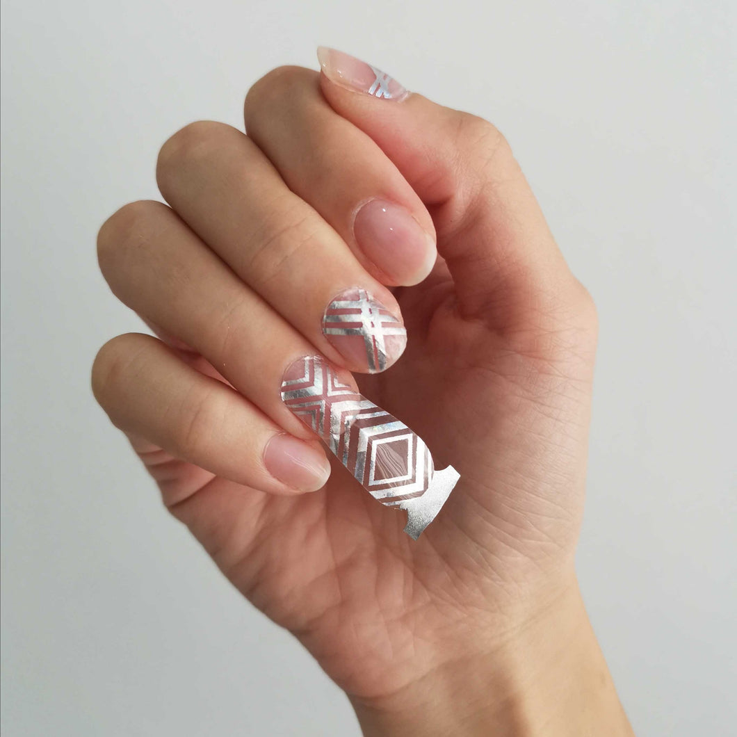 Buy Reign Holo Overlay Premium Designer Nail Polish Wraps & Semicured Gel Nail Stickers at the lowest price in Singapore from NAILWRAP.CO. Worldwide Shipping. Achieve instant designer nail art manicure in under 10 minutes - perfect for bridal, wedding and special occasion.