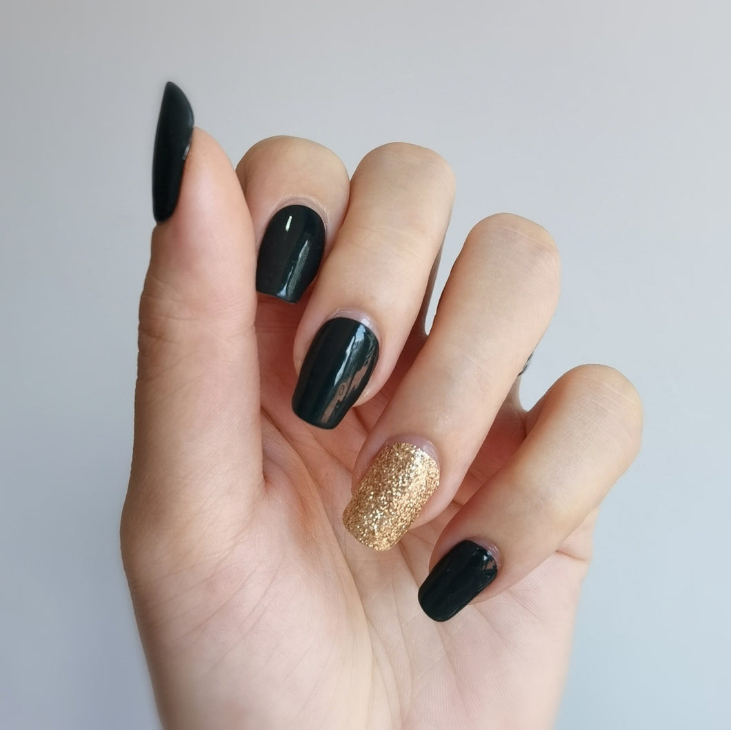 Black nail polish with gold glitter cascading tips. Start by painting your  nails one solid … | Dark nails with glitter, Black nails with glitter, Gold  glitter nails